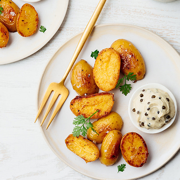 Pommes de terre sautées et crème fraîche au caviar