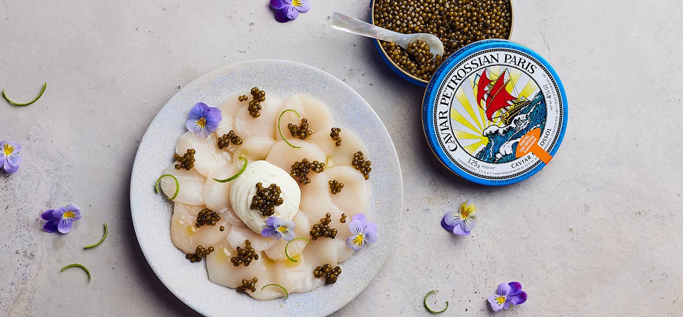 Scallop carpaccio, caviar and lime creme fraiche 